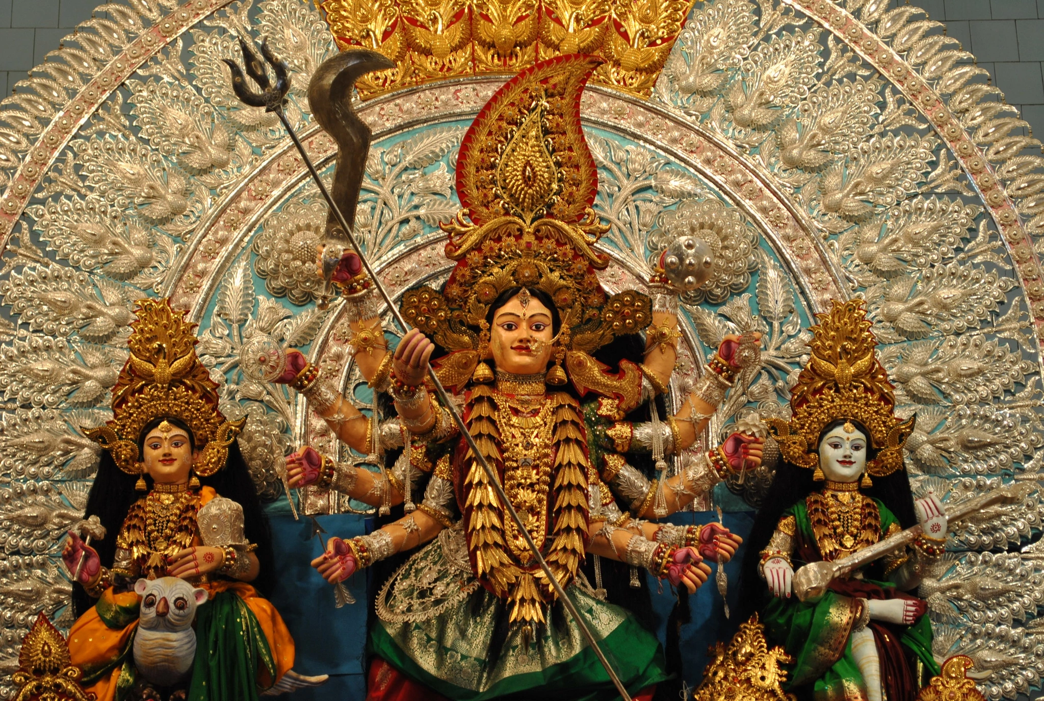 Choudhury Bazar Chandi Medha silver backdrop and Suna Medha gold ornaments in Kataka Durga Puja