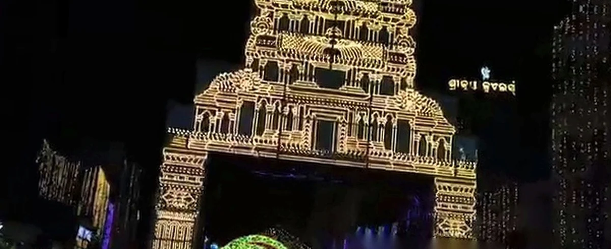 Station Bazar grand golden Gopuram temple light gate built from thousands of yellow pixel LEDs