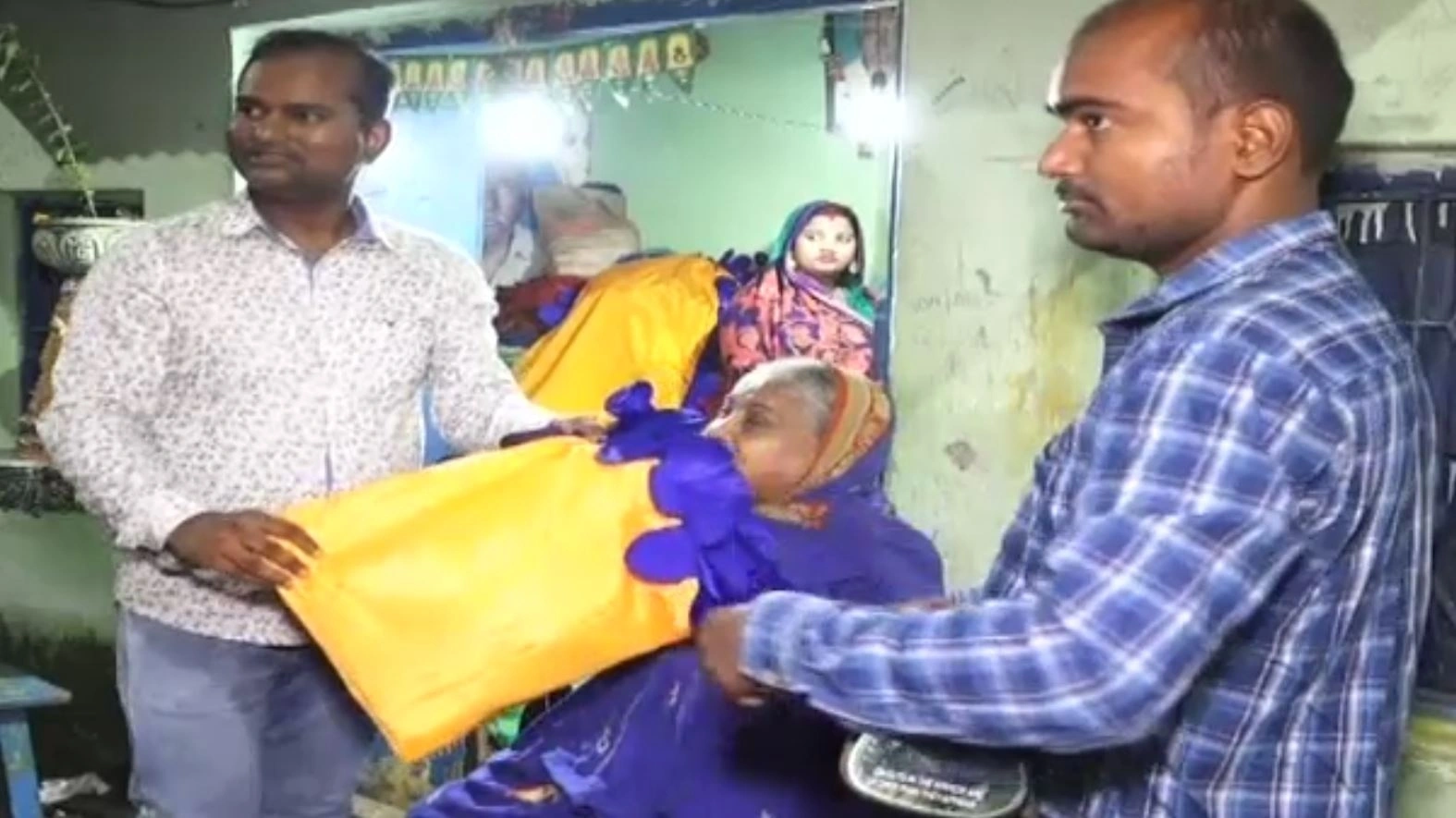 Traditional ceremonial Bhasani Nishan flags presented to Puja committee members for Kataka immersion procession