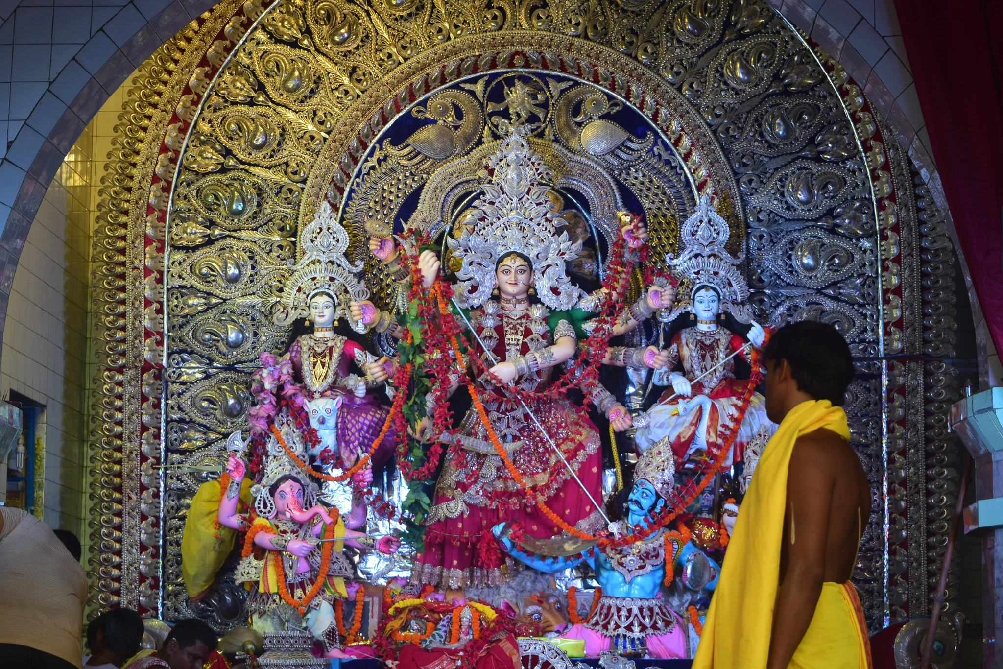 Goddess Durga with silver Chandi Medha and traditional priest rituals highlighting what makes Kataka Durga Puja distinctive
