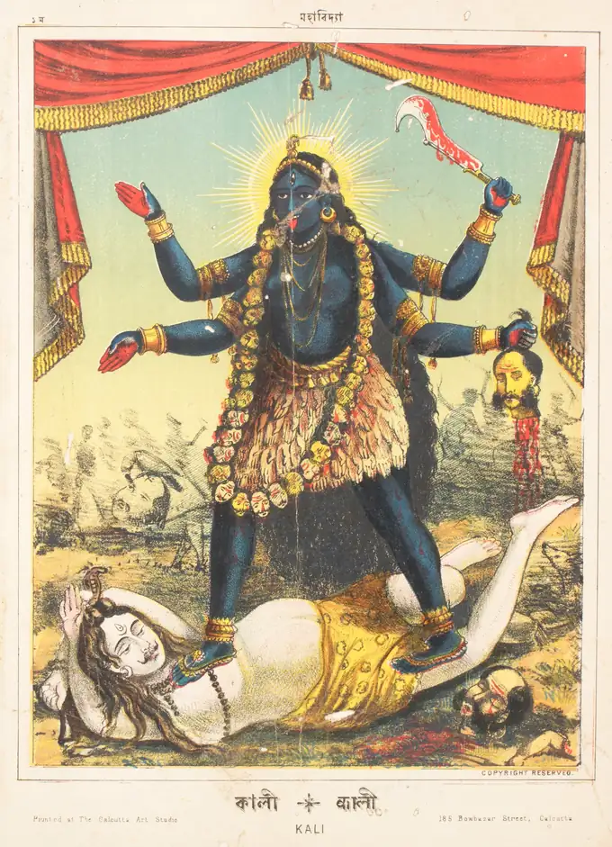 Goddess Kali standing upon Lord Shiva holding a sword and severed head, the first form of Dasha Mahavidya | localdrive